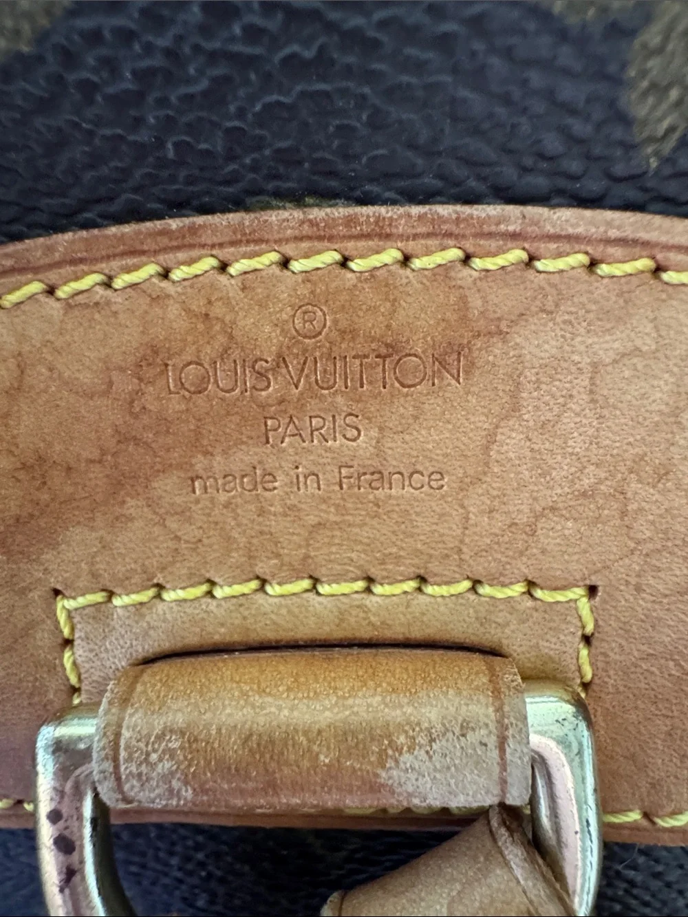 Louis Vuitton Monogram Drawstring Mini Backpack in Brown and Tan Leather Trim